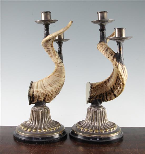 Anthony Redmile. A pair of rams horn and silver plated candlesticks, 14.25in.